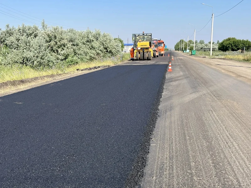 Юго-Западное ДСУ приступило к укладке первого слоя асфальта на Новоегорьевском тракте