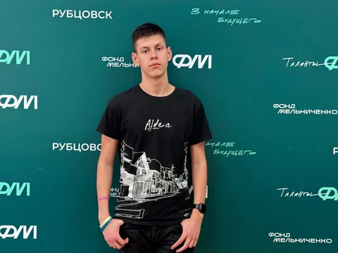 На фото Денис Сигаев - победитель олимпиады 